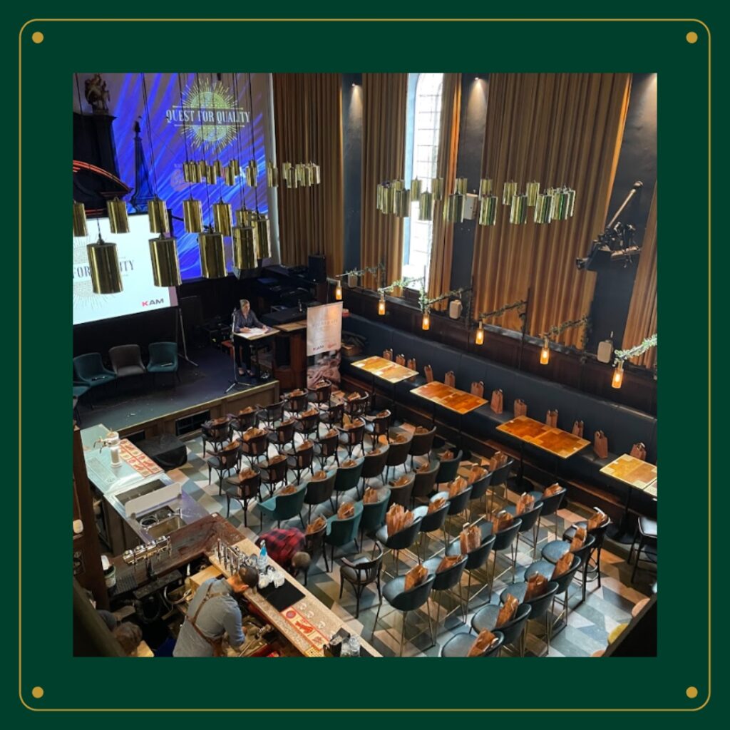 Amazing Grace London restaurant interior featuring tables and chairs arranged for dining.